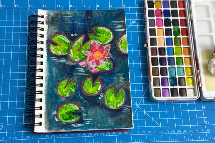 Watercolor painting of water lilies by Megan Coyle